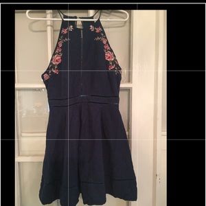 Navy dress with floral stitching